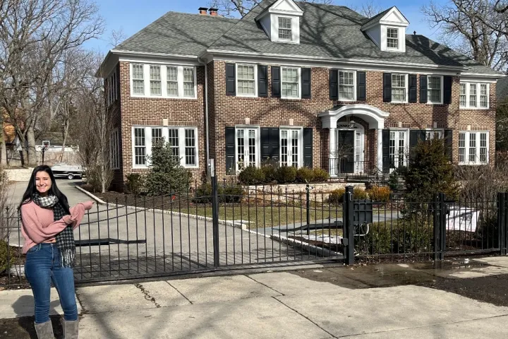 a person standing in front of a building
