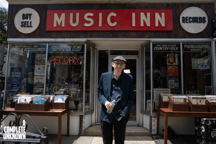 a person standing in front of a store
